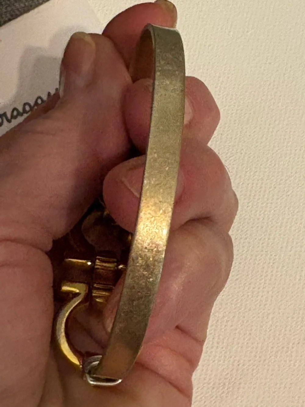 Authentic Salvatore Ferragamo charm set on unbranded bangle bracelet